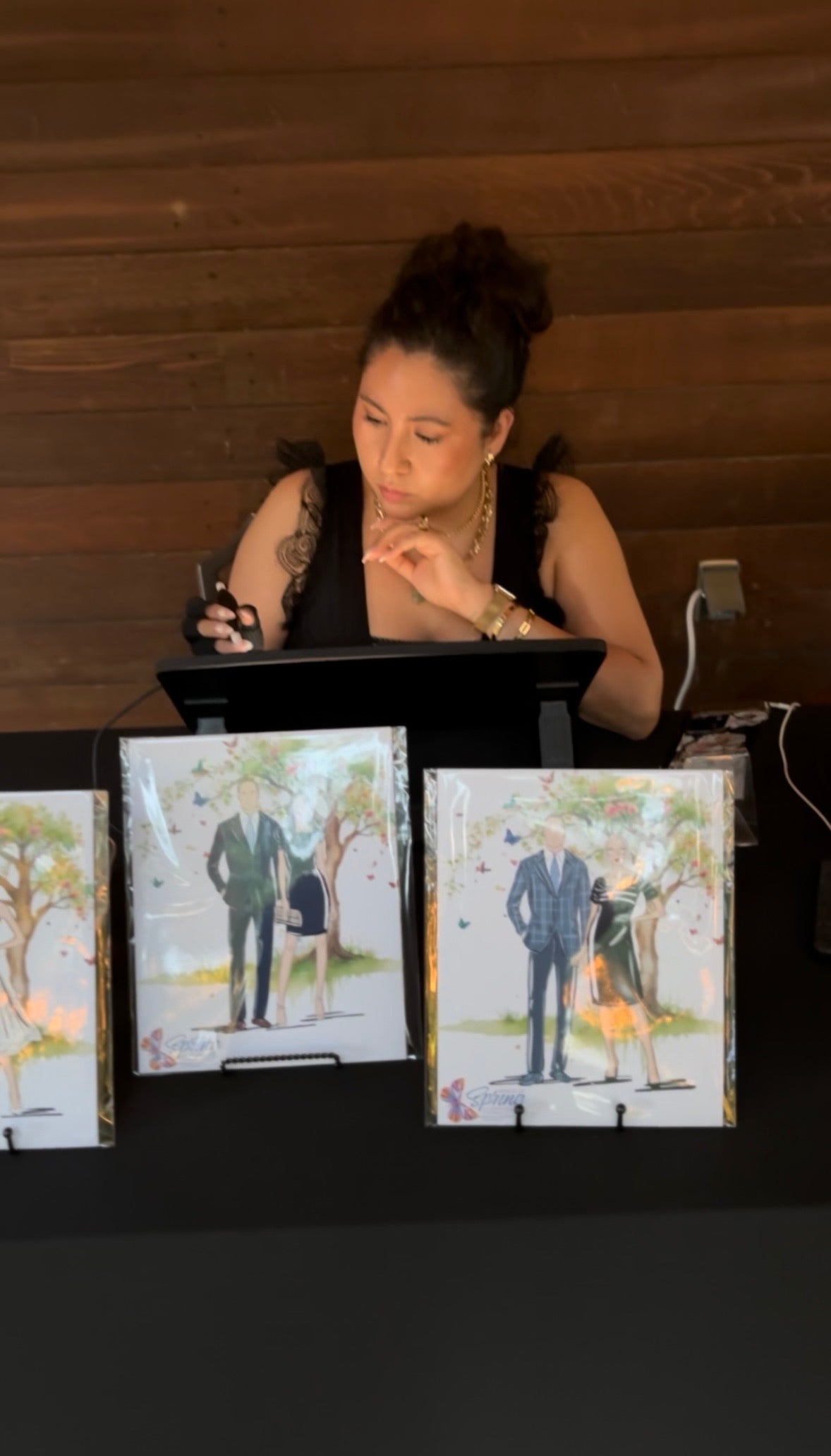 Live event illustrator creating personalized guest portraits at the Literacy Achieves Wings of Spring Gala in Dallas