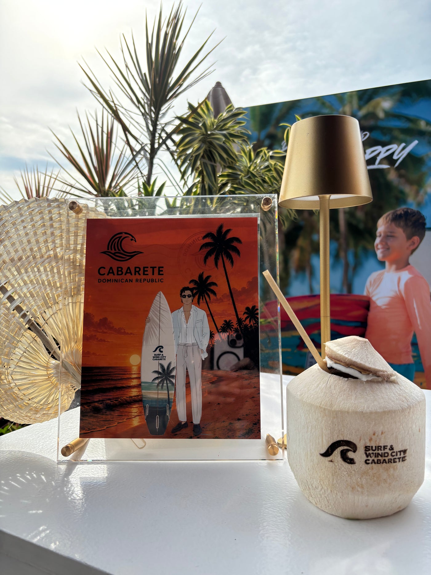 Custom Gavi Leveaux guest illustration displayed alongside branded Surf & Wind City Cabarete event details at a Dominican Republic activation.