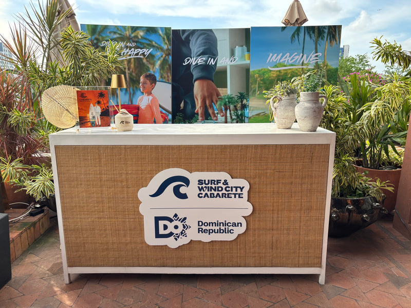 Branded event activation for Surf & Wind City Cabarete and the Dominican Republic featuring custom Gavi Leveaux fashion illustrations for guests.