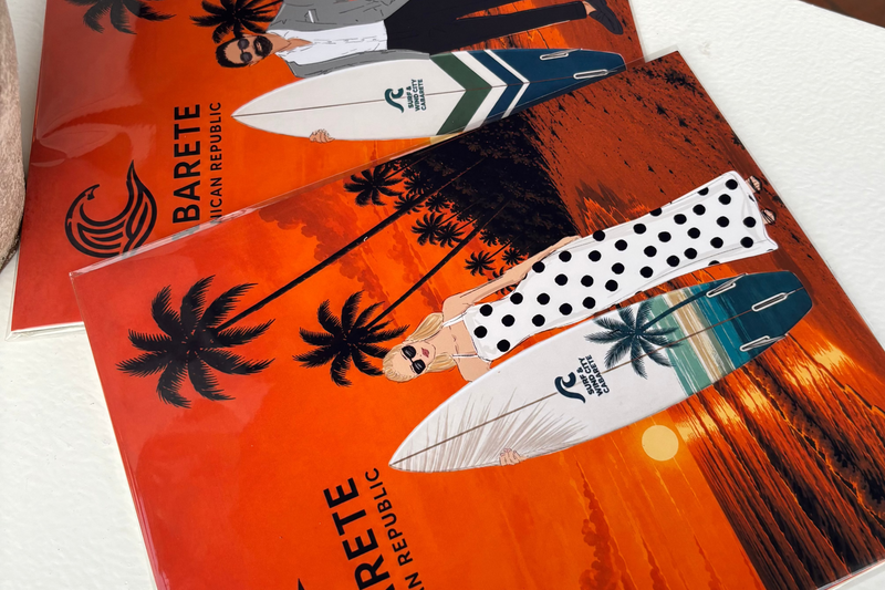 Custom guest fashion illustrations by Gavi Leveaux featuring personalized portraits with surfboards for a Cabarete, Dominican Republic destination brand activation.