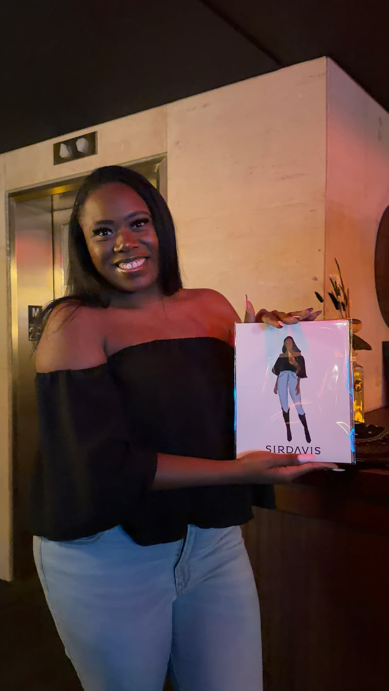 Guests receiving custom fashion illustration portraits at luxury brand activation event.