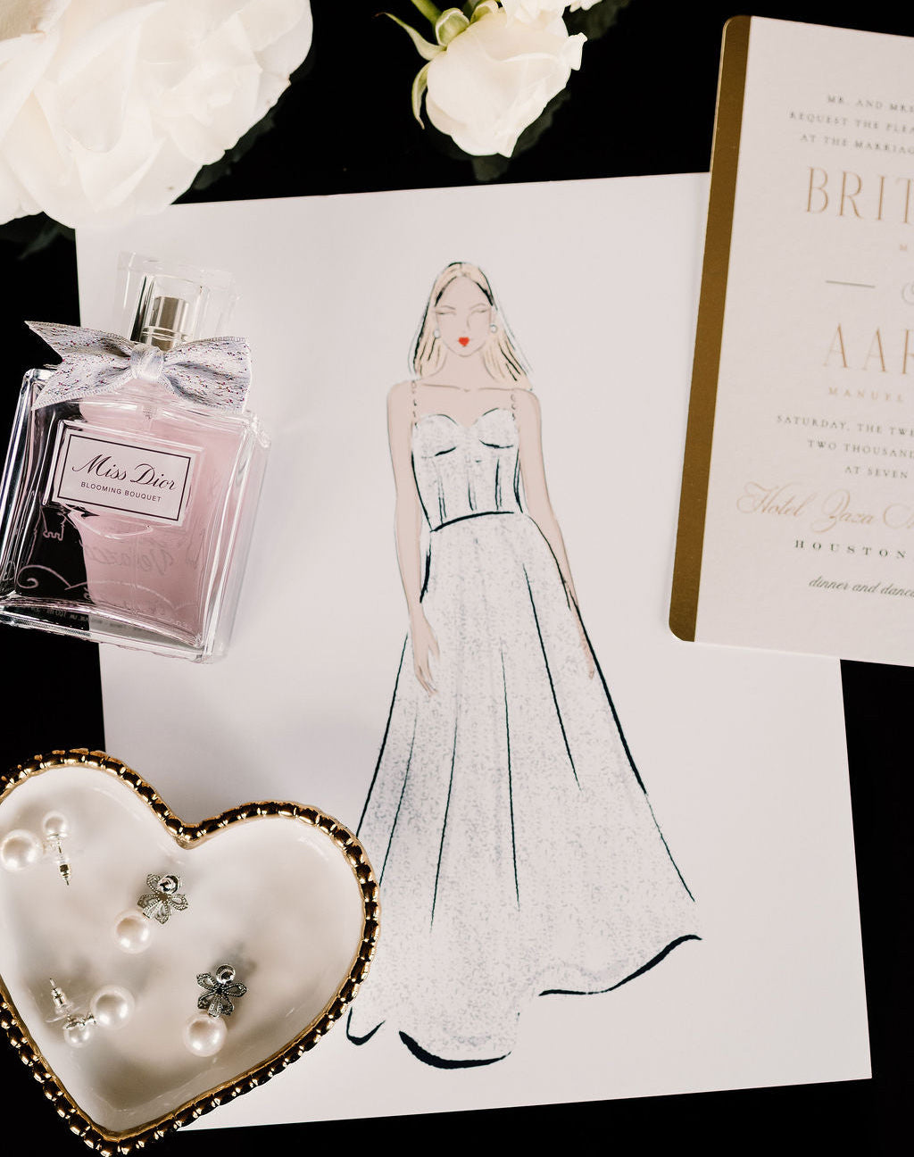 a live illustration of a wedding gown for a bride on her wedding day featuring a 
Dior perfume bottle